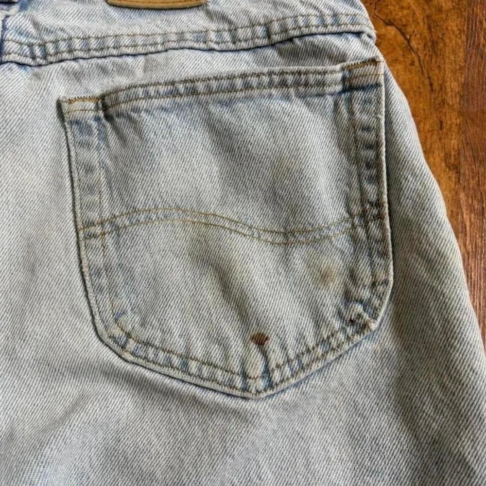 Lee blue denim shorts with paint marks and‎ writing, ultra faded